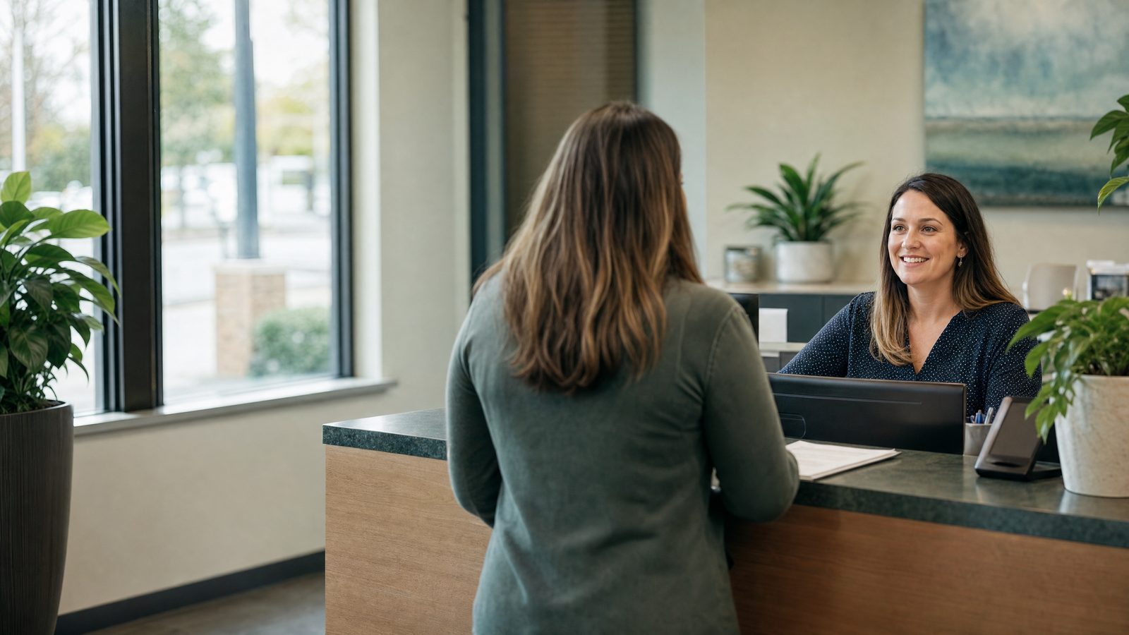 A member asking about a credit builder loan at a credit union counter
